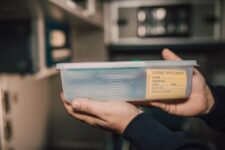 person holding box test medical